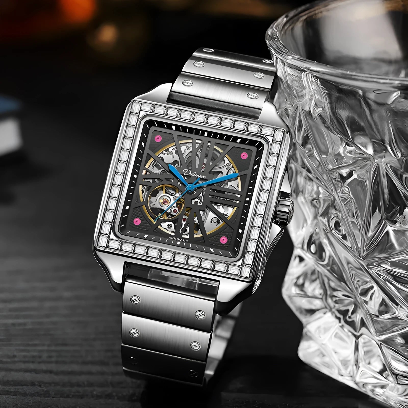 Men's square-faced automatic watch with diamond studs on a black leather strap