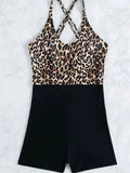 Women's one-piece swimsuit with leopard print, cross lace-up front, and slimming hip design