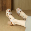 Open toe platform sandals for women in apricot colour with a microfiber upper and rubber sole.