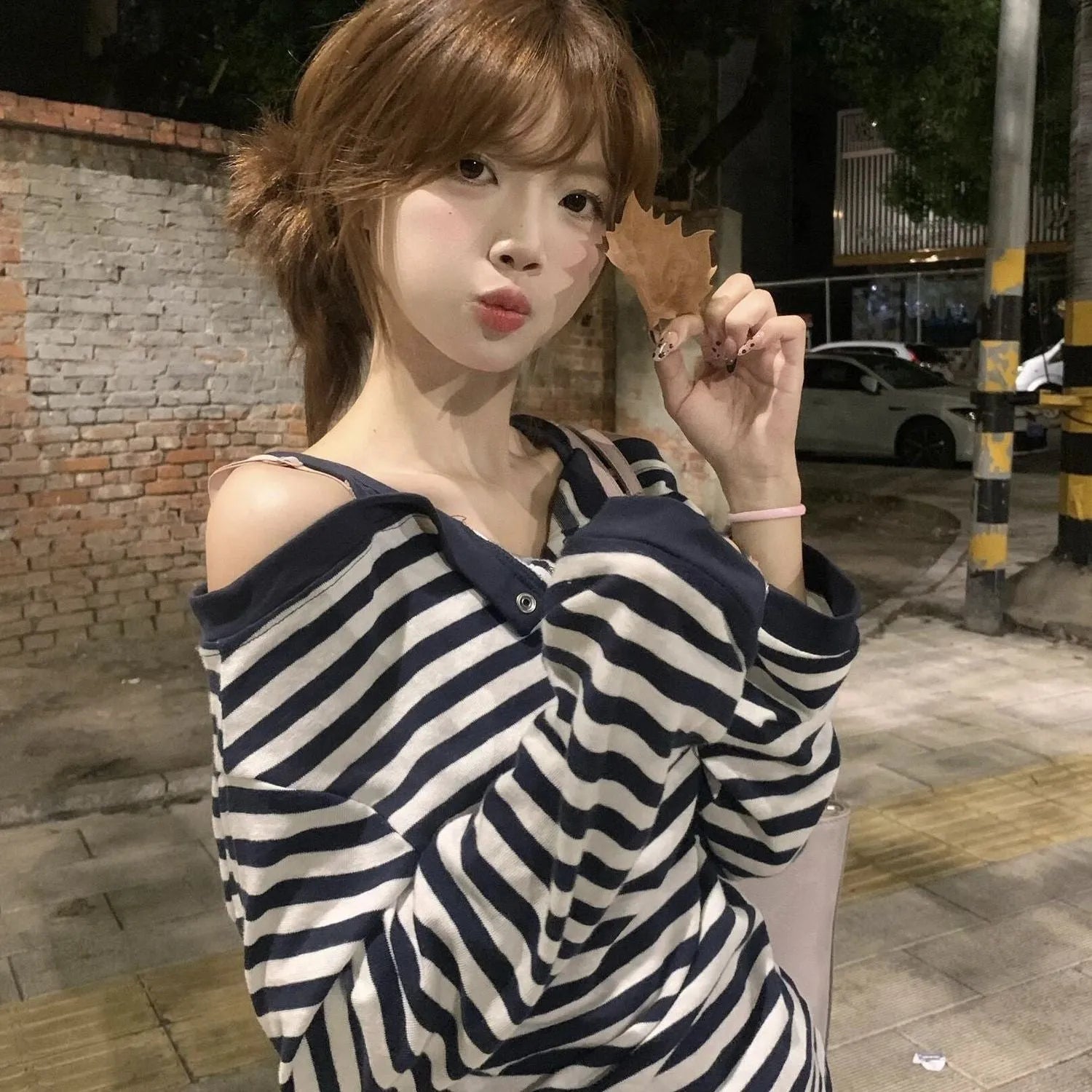 Dark blue Korean-style women's oversized t-shirt with embroidery details and long sleeves