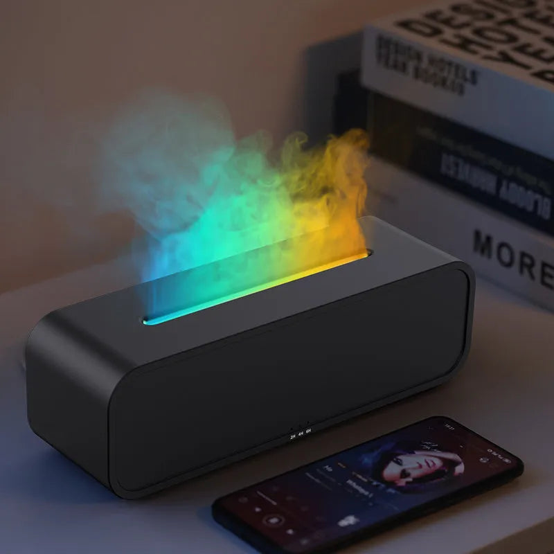 Black and white flame dynamic aroma diffuser with remote control on a wooden table