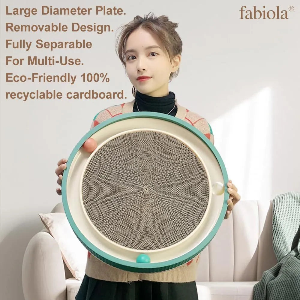 Large circular green cat scratching board with built-in ball toys and a replaceable cardboard core.