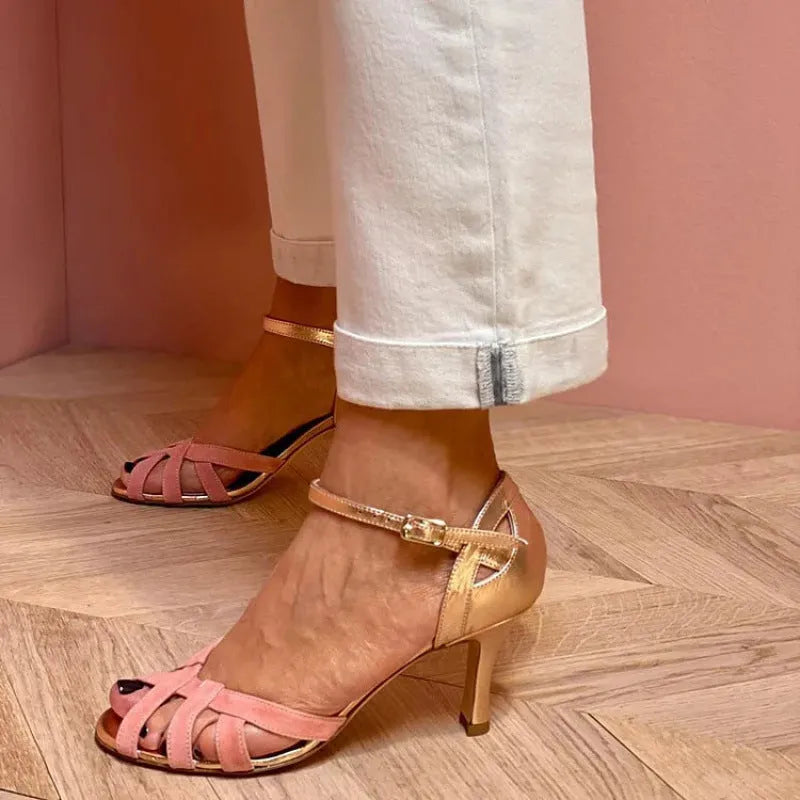 Peep toe sandal with buckle on an over-the-knee sock, shown in black, green, pink, or purple.