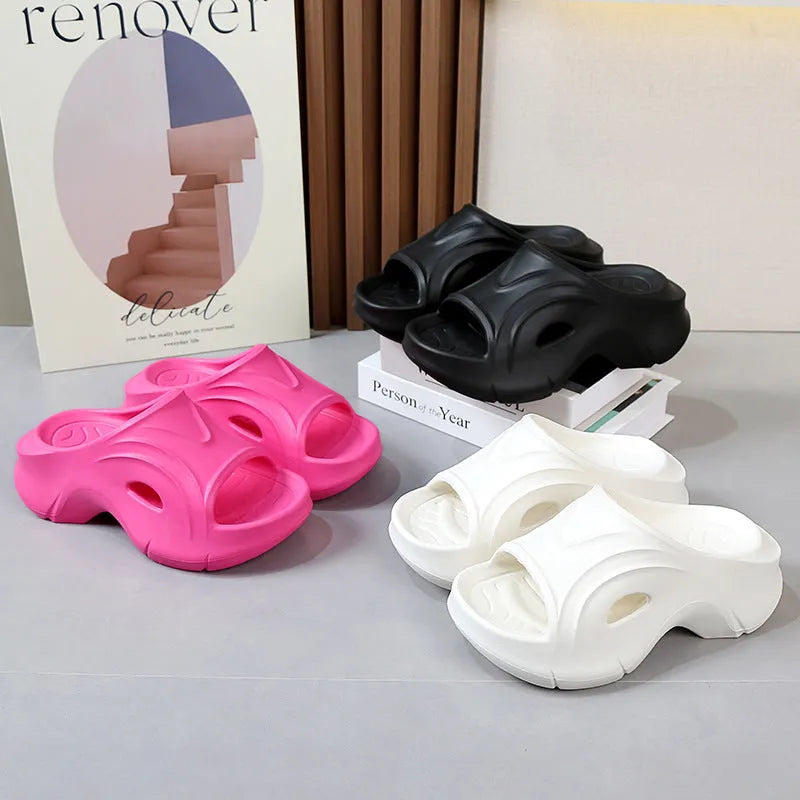Women's thick-soled EVA foam slippers in white, black, and rose red colours with round toe design