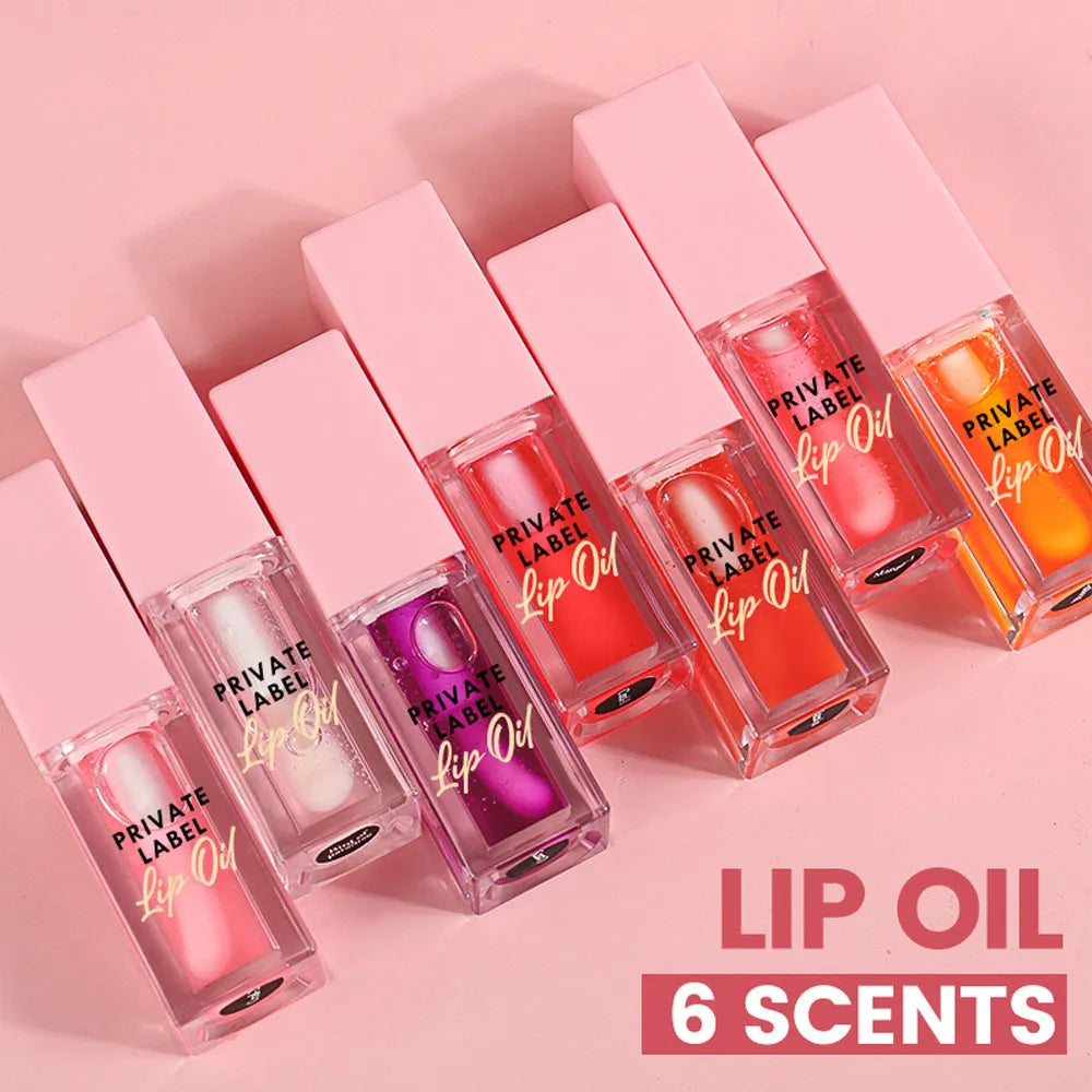 Women's transparent lip gloss set showing six 6ml tubes in fruity shades