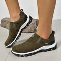 Men's thin oversleeve shoe cover in light brown with a round toe, shallow mouth, and rubber sole.