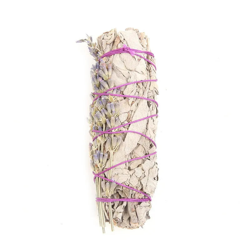 White sage and red rose petal colourful aromatherapy incense bundle on a wooden table