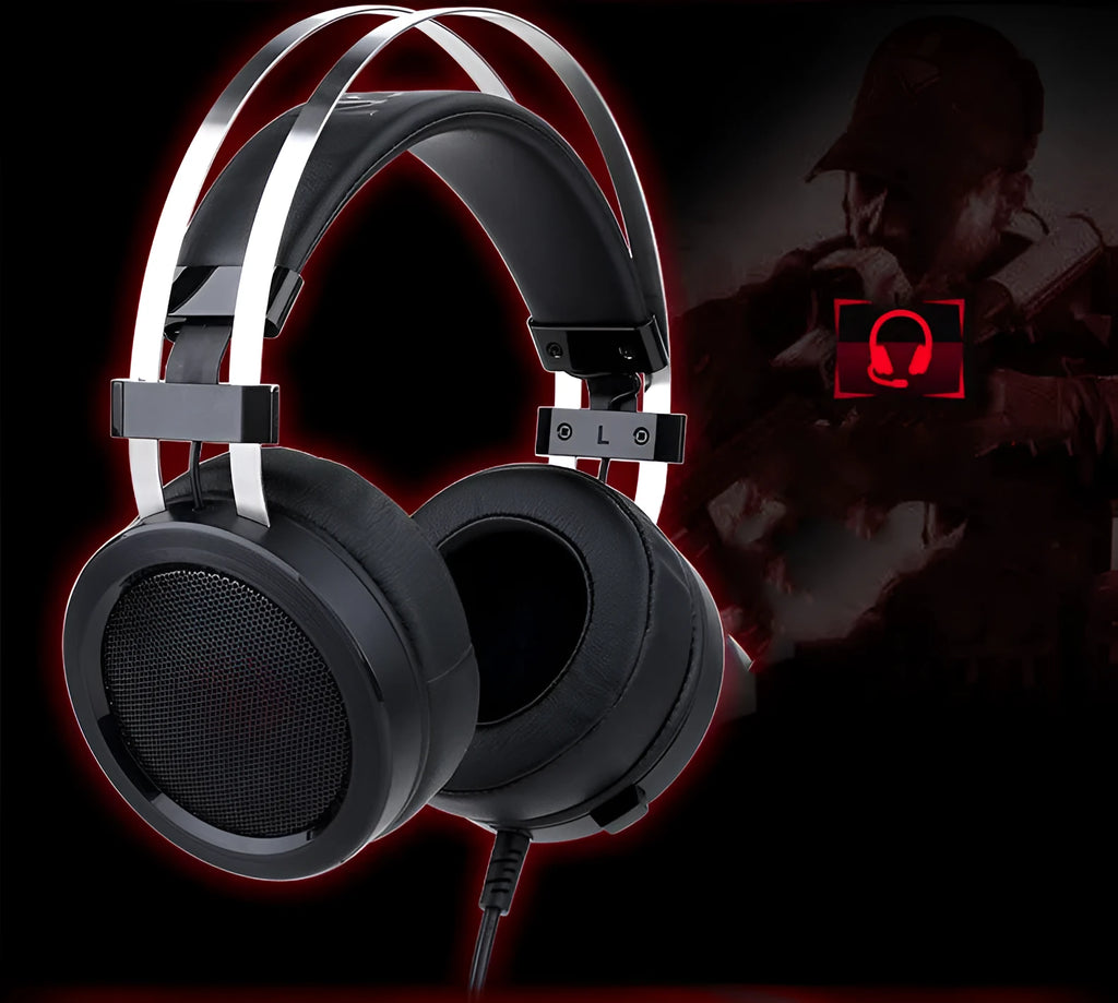 Black wired over-ear computer gaming headset with a 3.5mm jack and long cable.