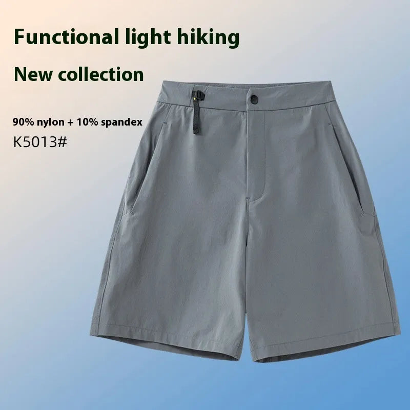 Men's quick-drying sports shorts in Army Green colour with elastic waistband, shown flat.