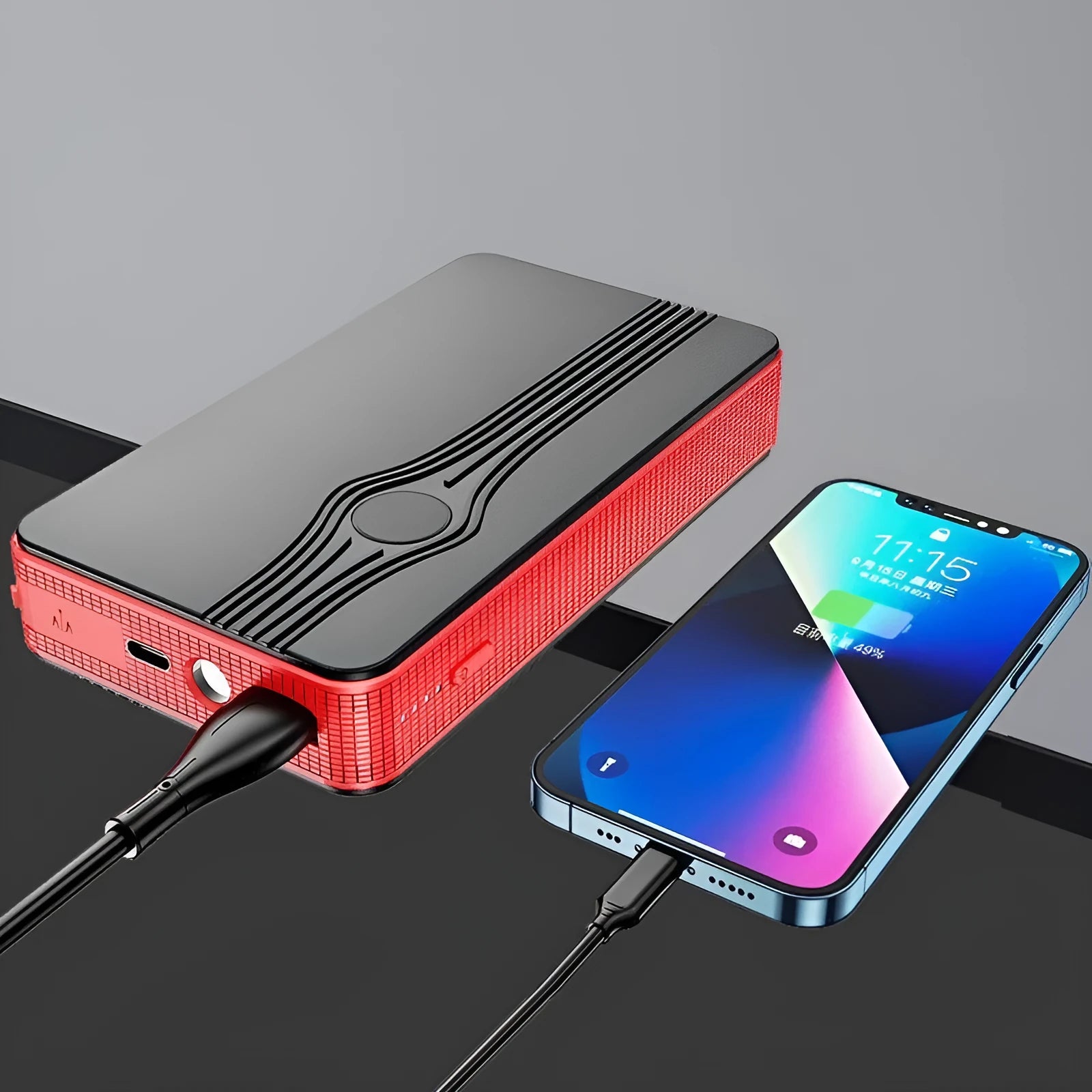 Red K4-E automobile emergency starting power supply and jump starter with USB cable.