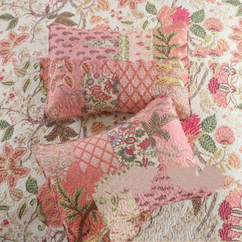 Handmade pure cotton bedding set in pink with flowers pattern on a 2.0m bed