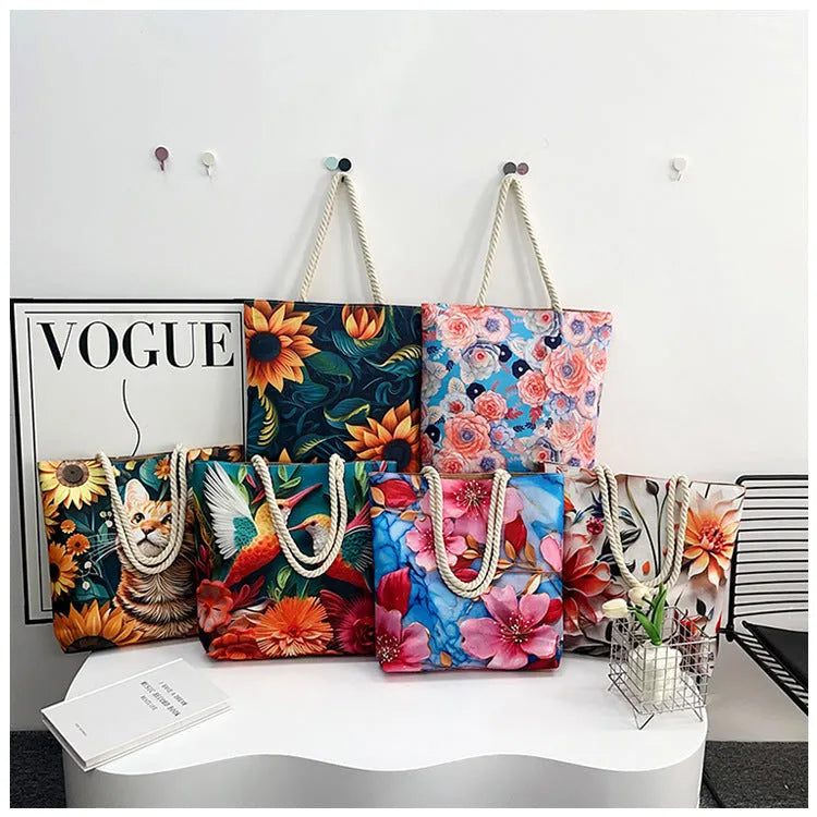 Cotton and linen canvas shoulder bag with double straps showing open pocket and zippered compartments