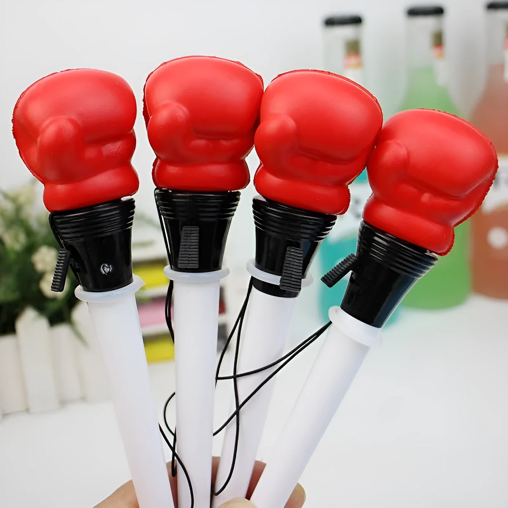 Four black pressure relief ejection pens with a plug-in sleeve fidget mechanism and 0.7mm bullet tips.