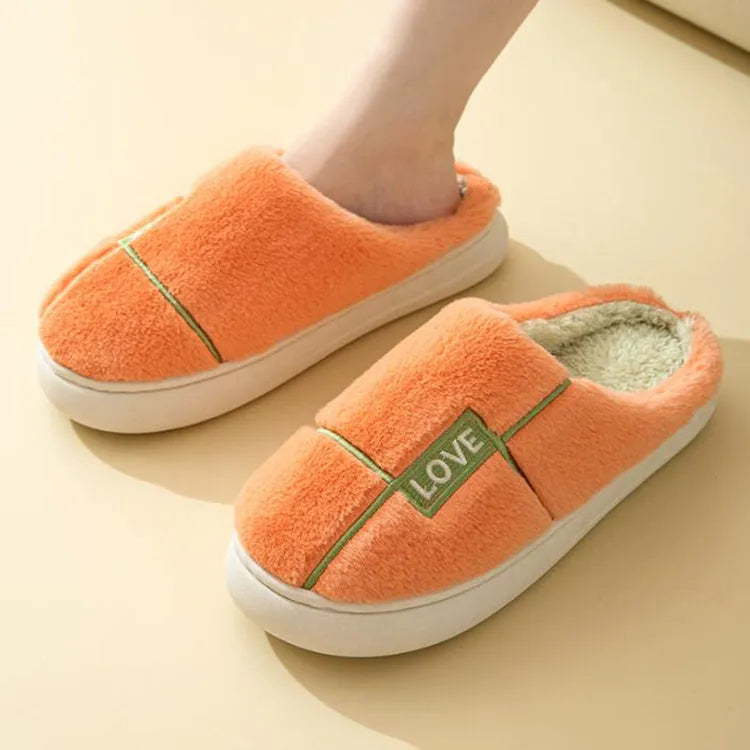 Women's furry indoor slippers in solid colour with plush upper, rubber sole, and wrapped toe, available in multiple colours