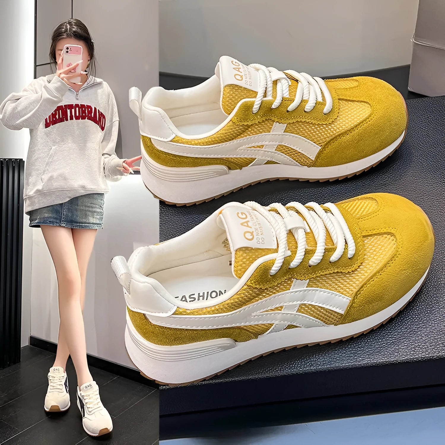 Women's white low-top lace-up sneakers with round toe on a flat plastic sole.