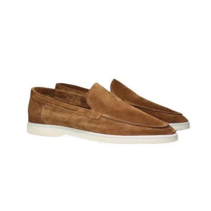 Men's matte suede flat shoes in sky blue with round toe and rubber sole on a plain background