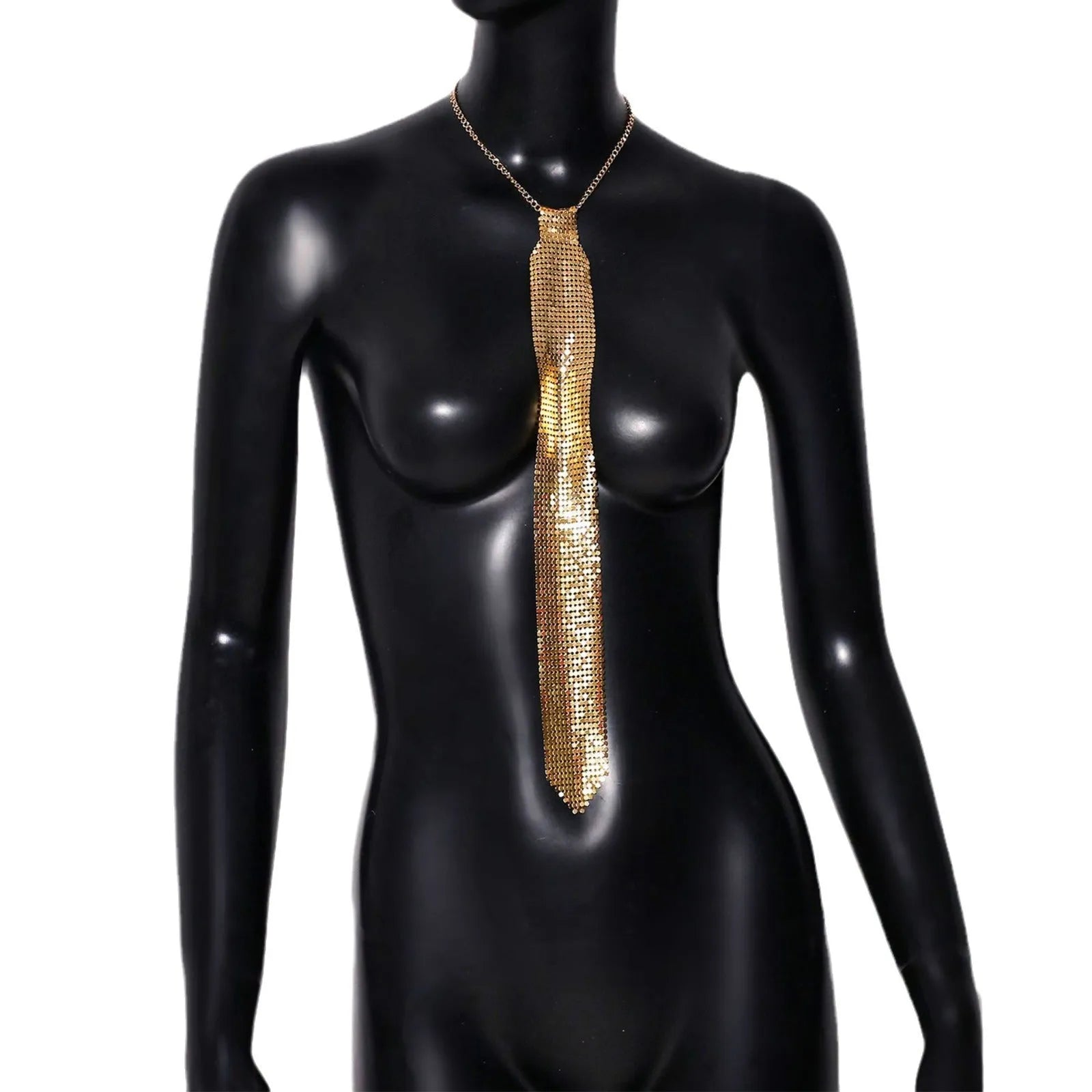 Silver metal sequin bow tie with arrow-style pointed ends on a black background