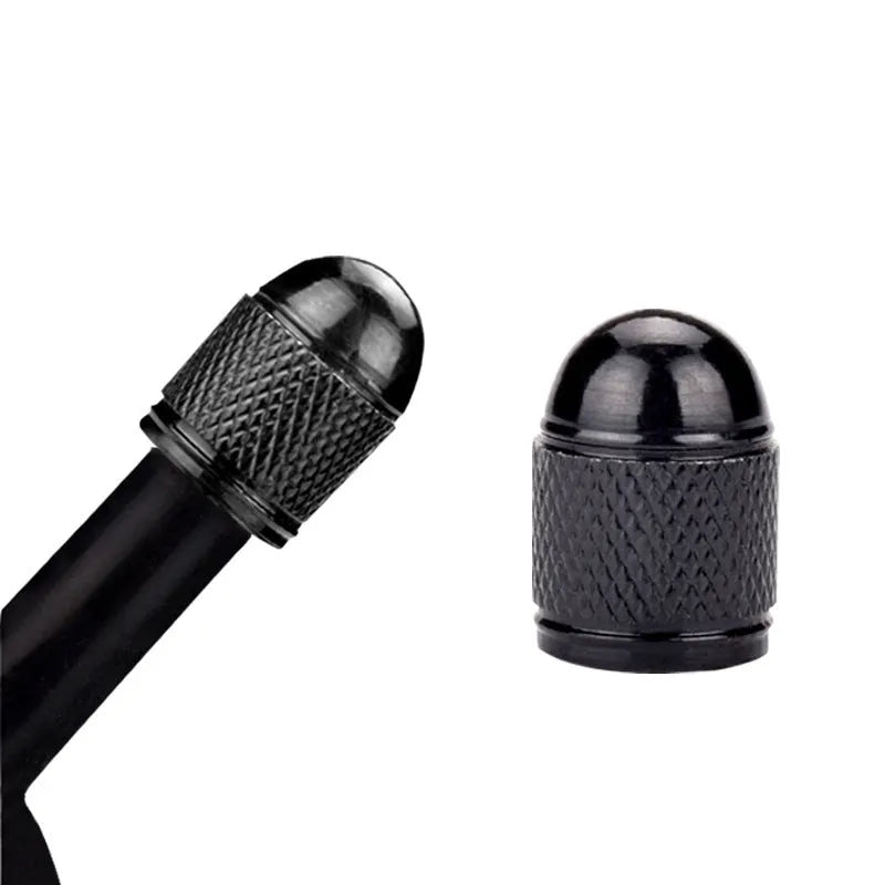 Aluminium alloy mountain bike tyre valve dust cap in silver, gold, red, blue, and black colours.