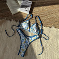 Women's split design printed bikini set in leopard and floral patterns, polyester fabric, sizes S to L