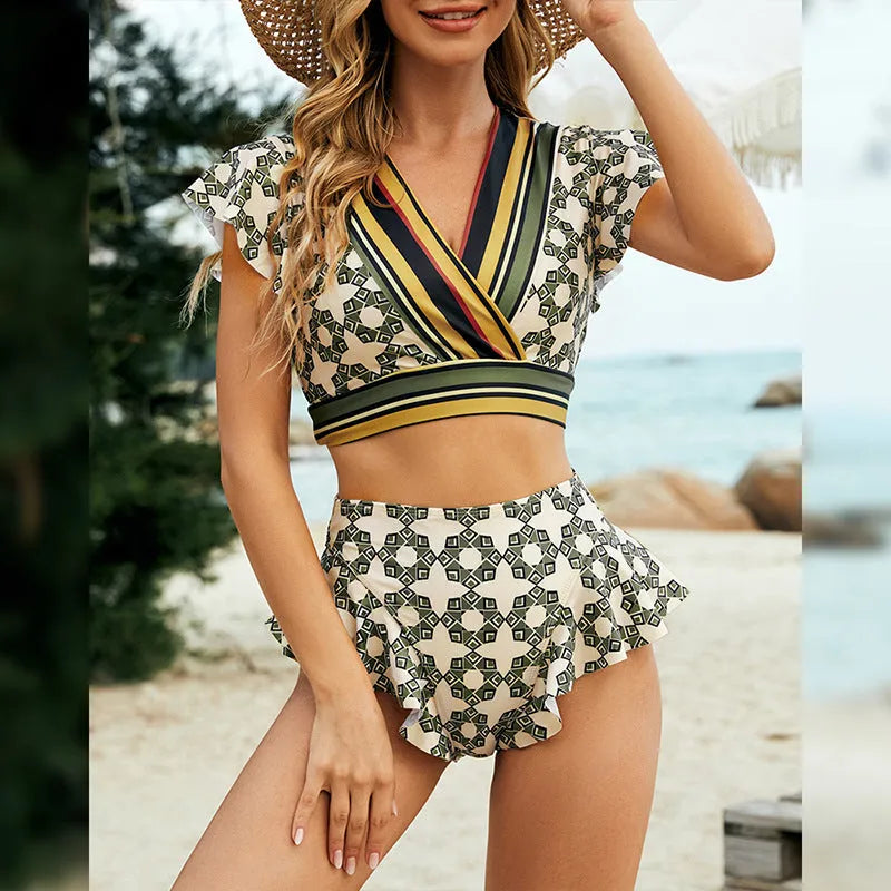 Green two-piece bikini swimsuit with backless lace-up V-neck top and matching shorts