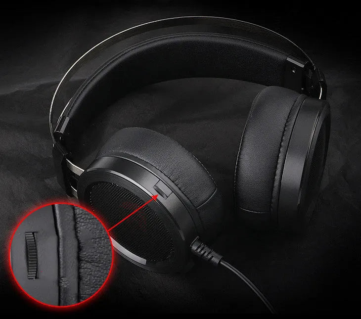 Black wired over-ear computer gaming headset with a 3.5mm jack and long cable.