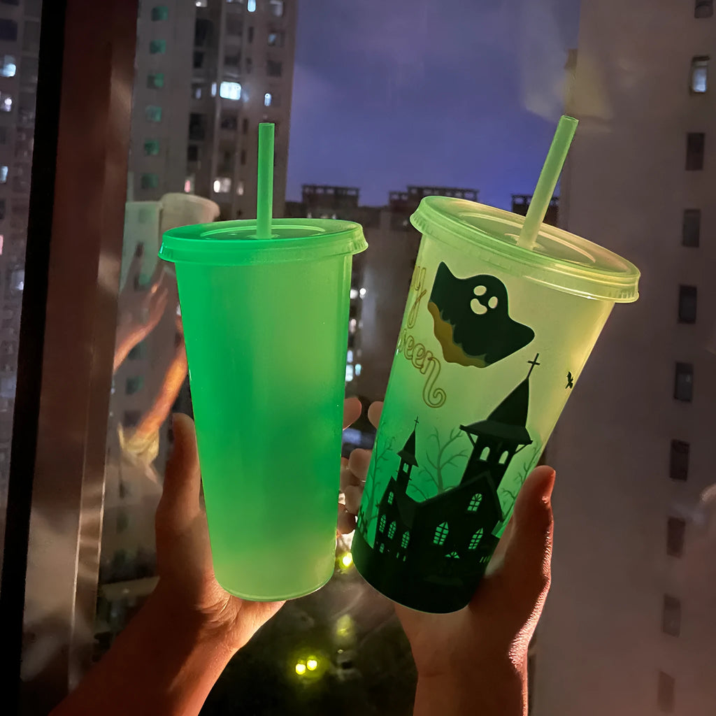 Halloween luminous plastic sippy cup with straw, 720ml capacity, in assorted colours.