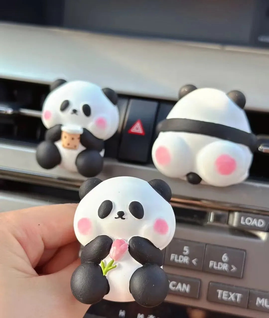 Cute panda car vent perfume decoration in milk tea, flower, and back panda designs.