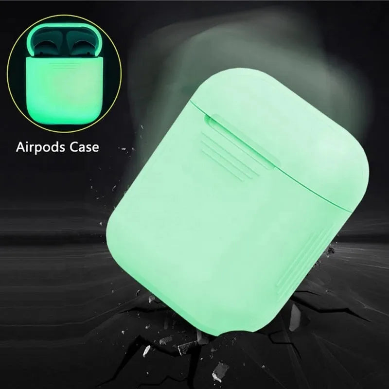 Luminous coloured silicone flip-case for Apple AirPods on a plain background.