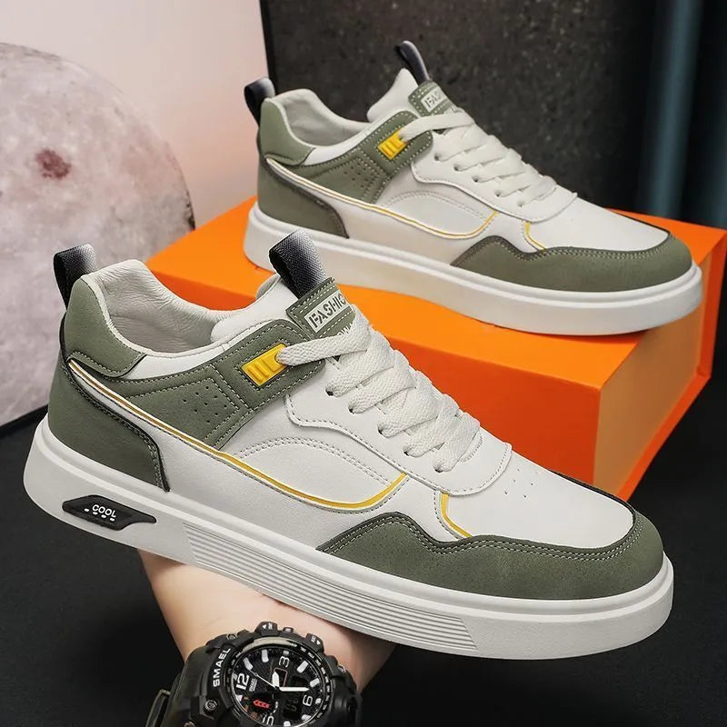 Men's low-top canvas trainers in black, beige, and grey with mesh lining and leather stitching.