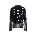 Black men's hollow knit hoodie with pearl decoration on the hood, showing loose fit.