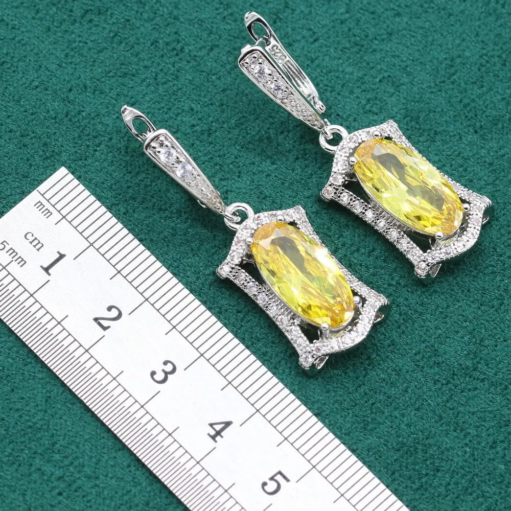 Zircon jewellery set with necklace, earrings, ring, and bracelet in yellow or olive green colours