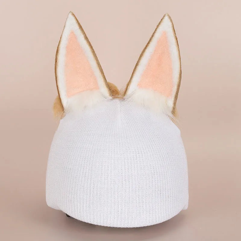 Plush cartoon-themed cover set on a medium motorcycle helmet with soft ear decorations.