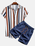 Man wearing a digital print short sleeve cardigan and matching shorts from a casual suit set.
