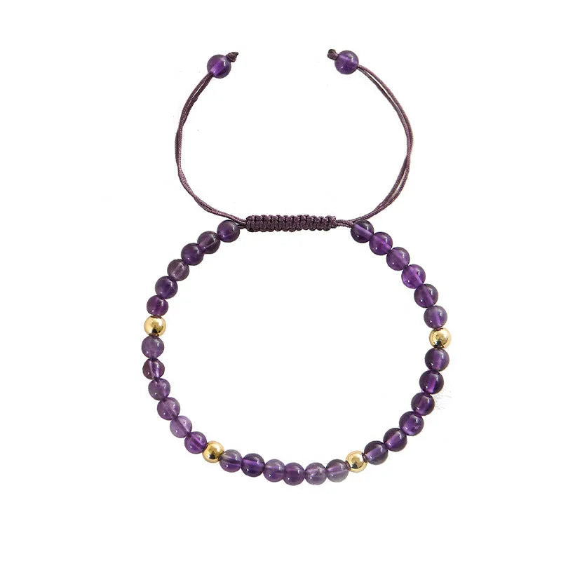 Handmade purple amethyst bracelet with 4mm stones and 14K gold clasp on wrist