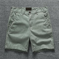 Cotton camouflage workwear shorts in multiple patterns with zip placket and mid waist design