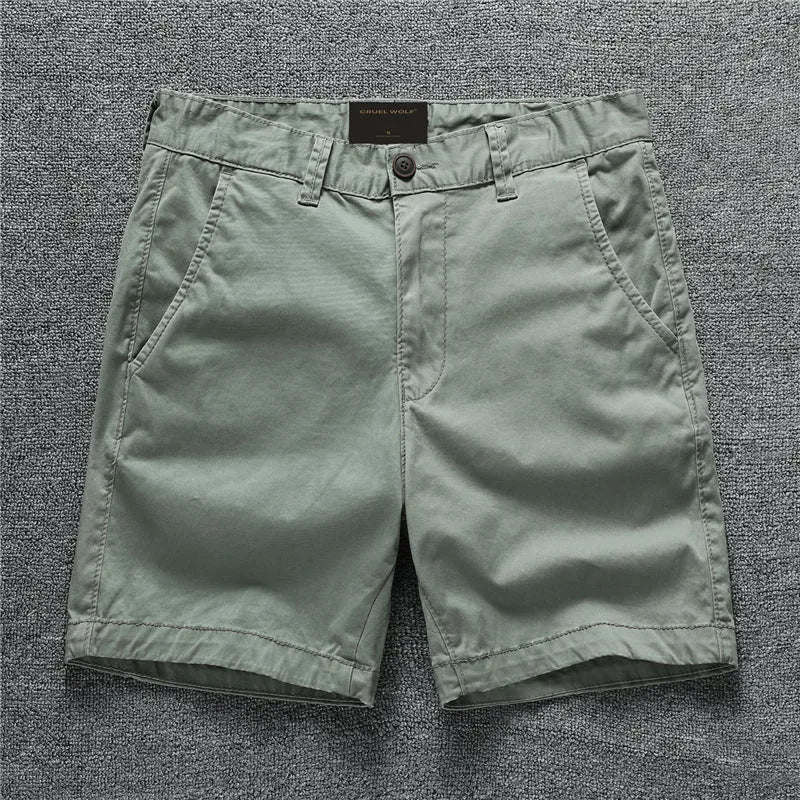 Cotton camouflage workwear shorts in multiple patterns with zip placket and mid waist design