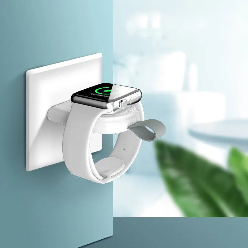 White portable wireless charging dock station for Apple Watch with USB cable.