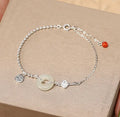 Hetian jade and 925 silver women's bracelet with geometric Chinese design and blessing card motif