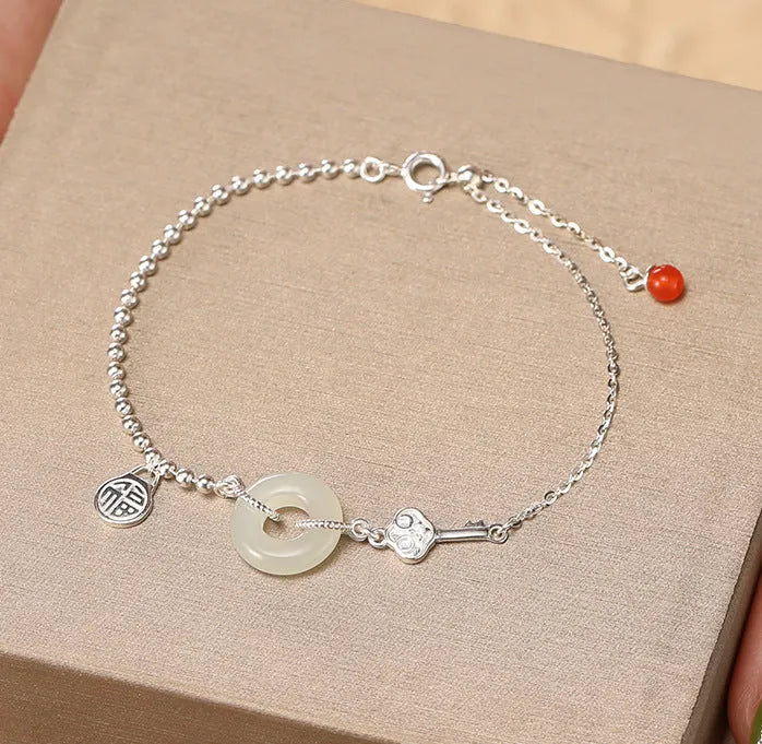 Hetian jade and 925 silver women's bracelet with geometric Chinese design and blessing card motif