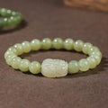 Gray jade ethnic style beaded bracelet for women shown in three bead size options.
