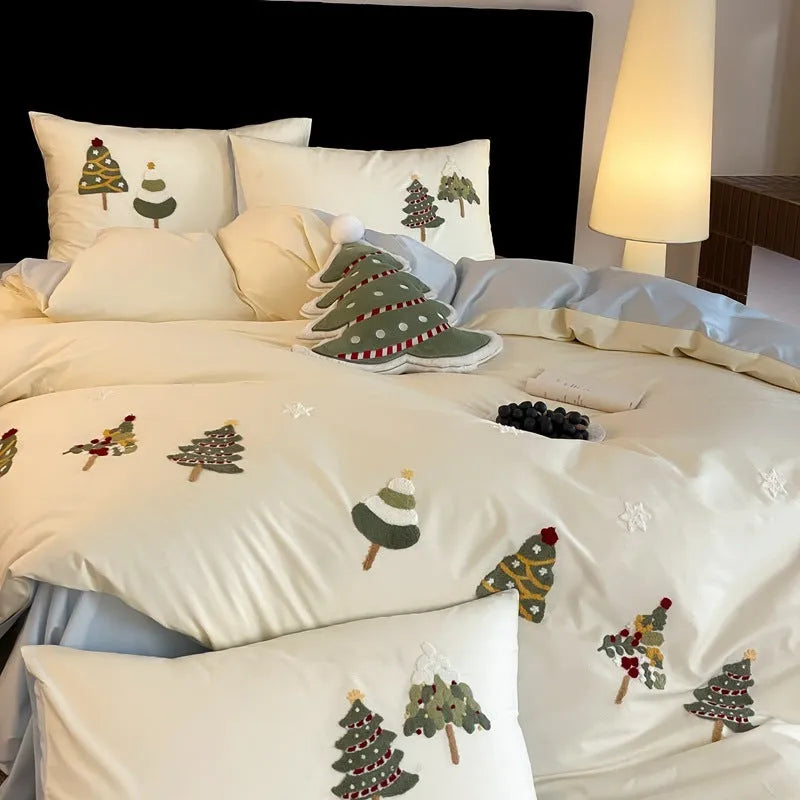 Pure cotton bedding set with embroidered Christmas tree and flowers on duvet cover and pillowcases.