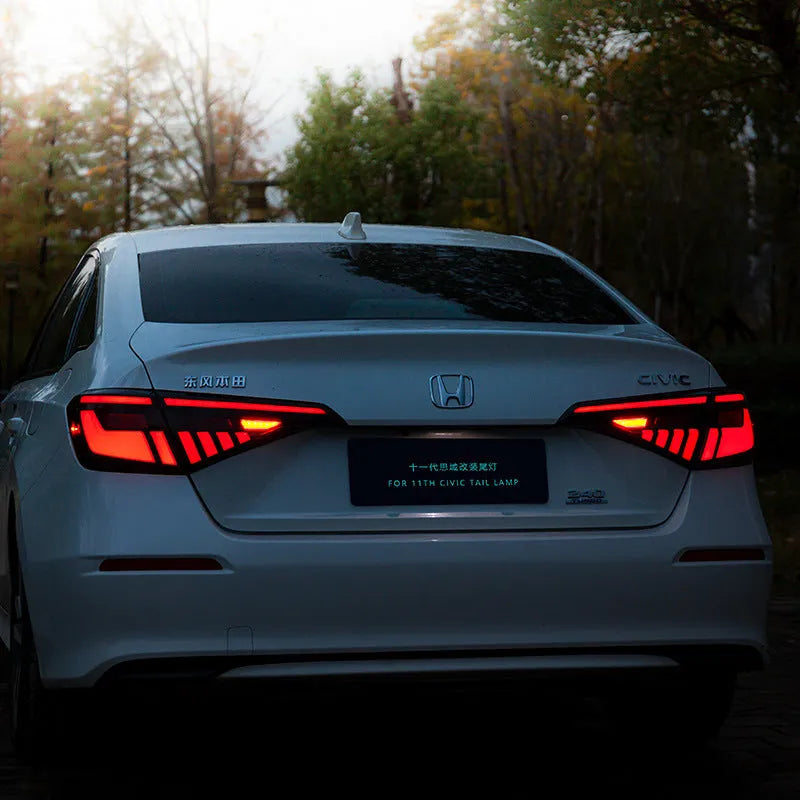 11th Generation Honda Civic black and red modified LED taillight assembly with dynamic streamer indicators