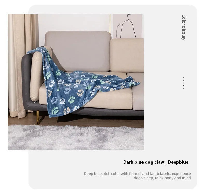 Blue cartoon dog pattern on a double-sided thickened flannel pet blanket laid flat.