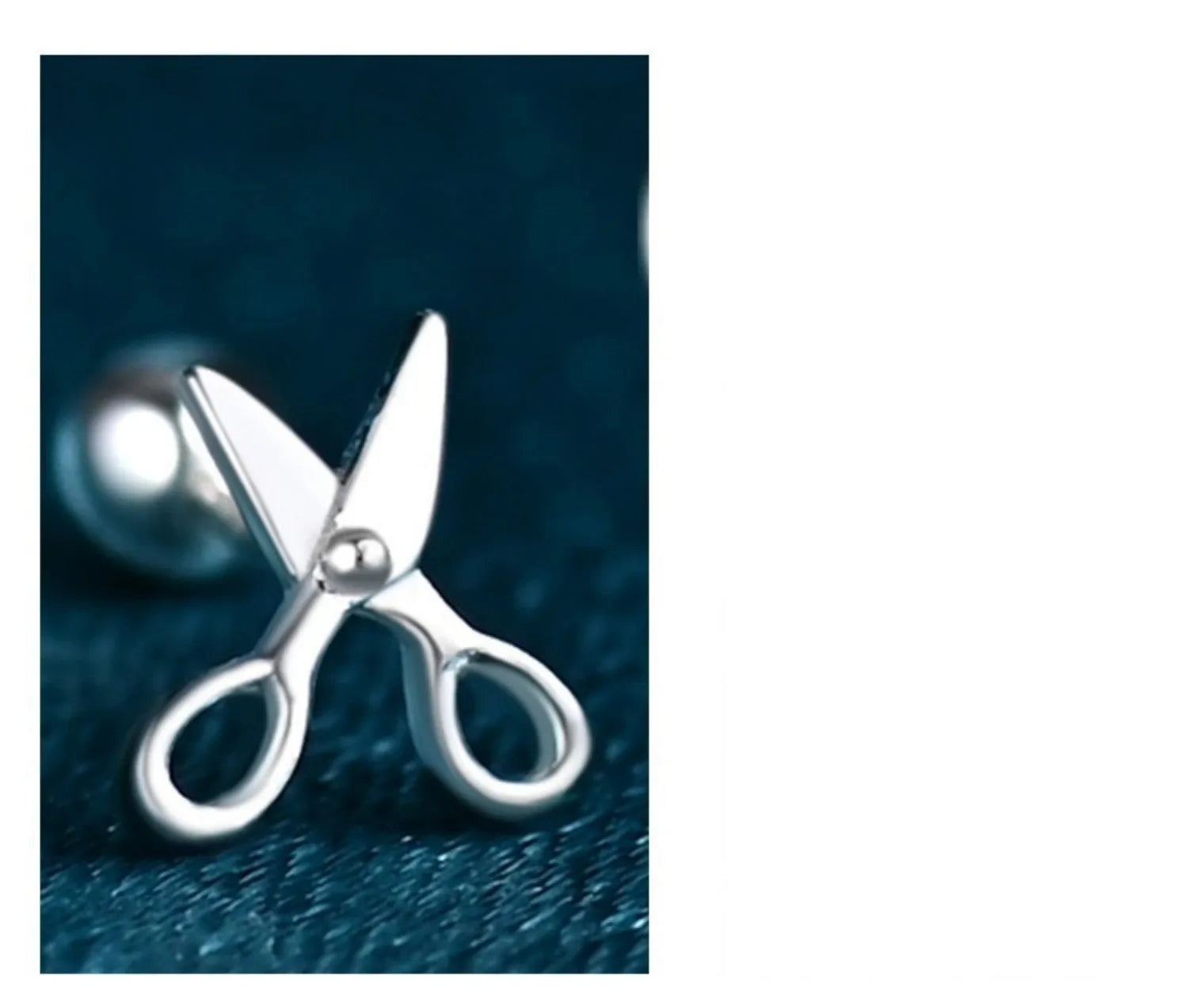 A pair of pure silver screw-style ear nails for cartilage piercings on a plain background.