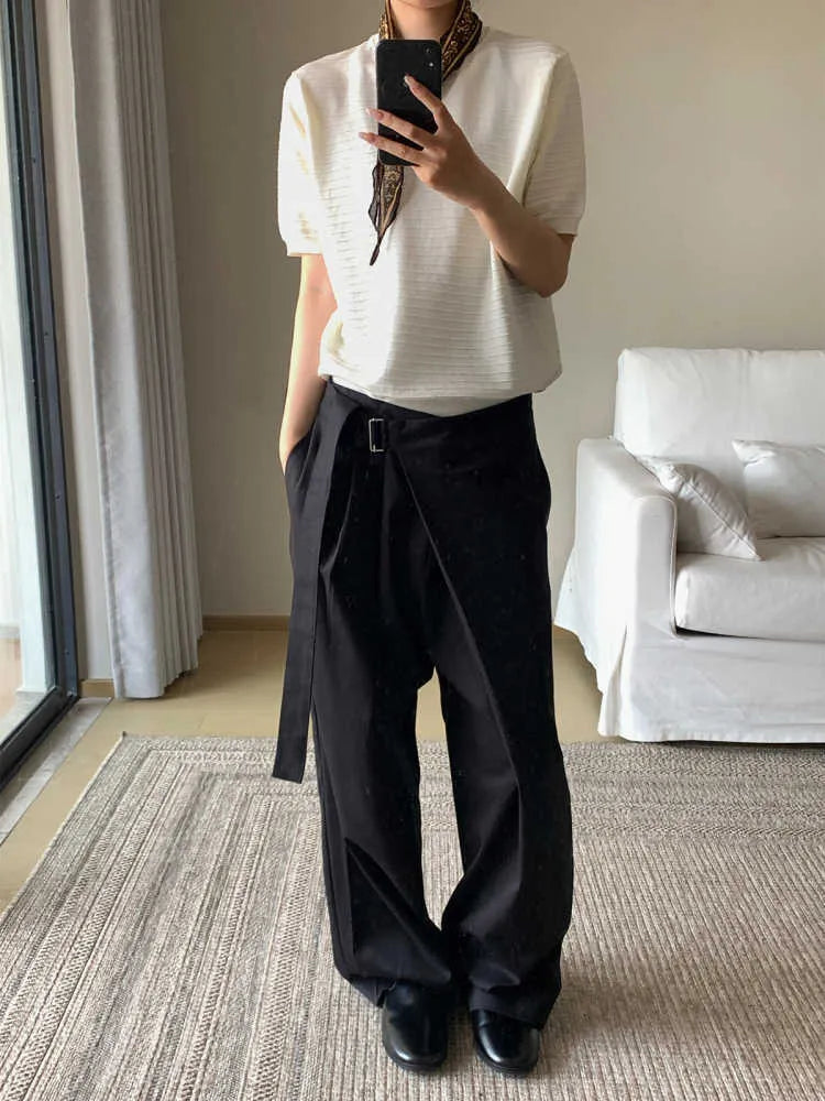 Black women's straight-leg trousers with a single pleat front and adjustable waistband on a hanger.