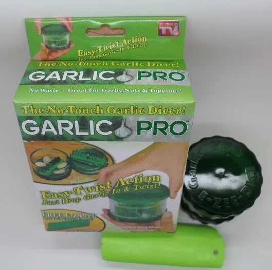 Green transparent polypropylene garlic peeler on a kitchen counter
