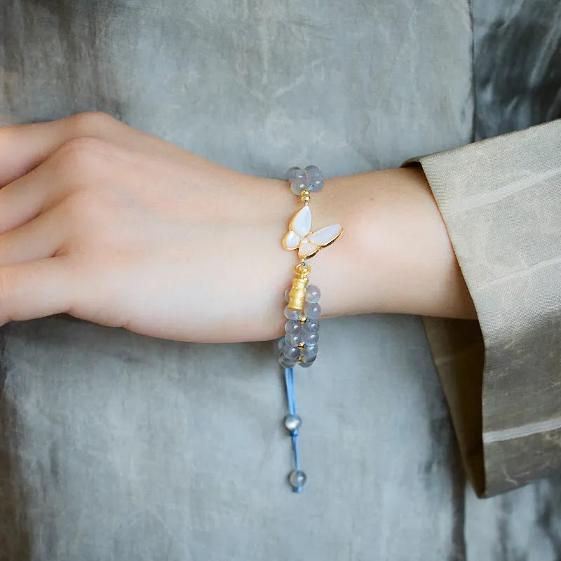 Grey moonstone butterfly charm woven bracelet for women with geometric retro design