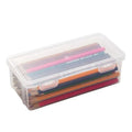 Transparent plastic pencil storage box showing organised drawing tools inside