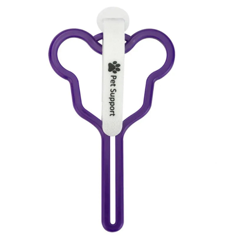 A coloured dog poop bag holder with a Velcro strap attached to a dog lead.