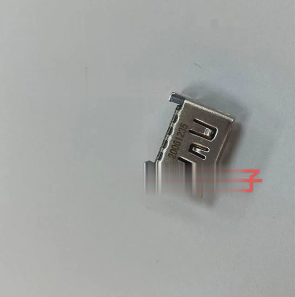 Silver HDMI host socket connector for game console repair.